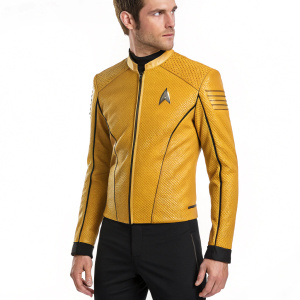 High-definition picture of a Star Trek: Discovery uniform. Resembles Chris Pine's costume. Vibrant yellow with a zipper, A-shaped logo on chest, and matching black pants.