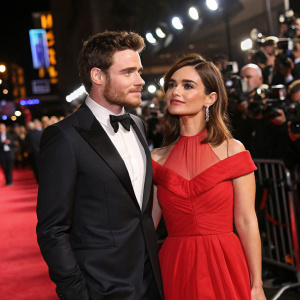 Richard Madden and Jenna Coleman at a glitzy Hollywood event. Red carpet ambiance, paparazzi flash photography