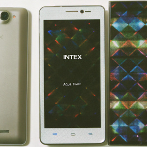 Photograph showcasing Intex Aqua Twist smartphone. Prism-like colors on front. White background. Intex logo on back.