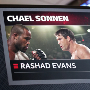 Screengrab from MMA event website. Focus on Chael Sonnen vs Rashad Evans match. Promotional image with fighters in combat stance. Event details and athlete bios in text format. Standard webpage design.