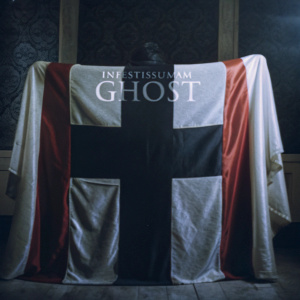 An album cover photo of 'Infestissumam' by Ghost. A dark and dramatic setting with red and black colors. The cover features a large black cross-like design on a red background.