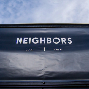 Cast and crew list for the film 'Neighbors'. Dark screen with names displayed in white text.
