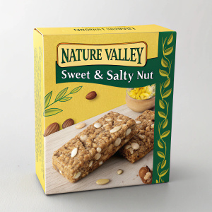 Realistic packaging design for a new Nature Valley snack. Vibrant yellow box with green accents. Features a granola bar with nuts. Clear label reads 'Nature Valley Sweet & Salty Nut'