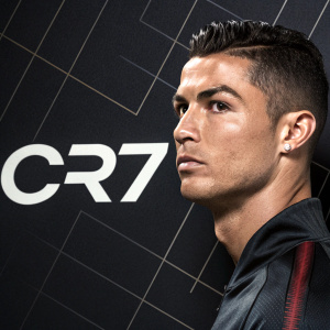Cristiano Ronaldo in a promotional shoot. Intense stare, black background with grid design and 'CR7' logo