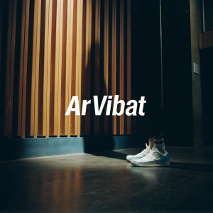 Ar'Vibat brand logo, sleek design in blue and white, against vibrant red backdrop. Subtle shadows from studio lighting.