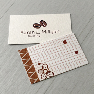 Karen L. Milligan's business cards. Modern design with quilting theme. White cards with brown accents, featuring grid pattern. Includes name, description of craft, and contact info. Creative coffee beans design.