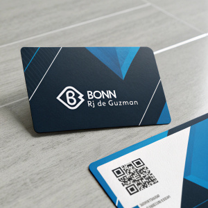 Business card for Bonn Rj de Guzman featuring modern logo, contact details, QR code, barcode. Design in blue and black tones.