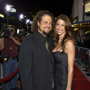 Joseph D. Reitman and Shannon Elizabeth at the 'Jay & Silent Bob Strike Back' premiere in Hollywood. Posing for photographers. Red carpet event.