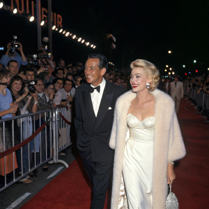 Ezio Pinza and Lana Turner at the premiere of Mr. Imperium. Crowds cheering, red carpet event