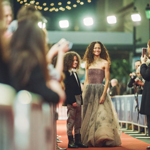Nico Parker and Thandie Newton on the bustling red carpet at the 'Dumbo' premiere event.