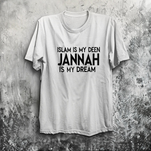 White t-shirt with 'Islam is my Deen Jannah is my dream' printed in bold black letters. The background is a plain, grey wall.