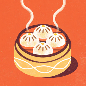 Soup dumplings (xiao long bao) in a steamer basket