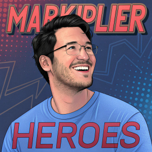 Markiplier, the friendly gamer, smiles with a close-cropped beard. Blue t-shirt. Digital graphic background featuring 'Markiplier HEROES' in bold red font.