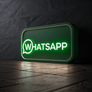 A minimalist logo for WhatsApp featuring a vibrant green chat icon overlaid with the app's name in sleek, modern font. Dark background highlights the green icon and text, creating a sleek, contemporary look. The logo emphasizes brand identity and is designed for easy recognition.