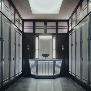 High-tech bathroom scene from Prey video game. Blue LED lighting, sleek metal cabinets, futuristic sink.