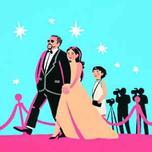 Emilio Estefan, Nayib Estefan, and Emily Estefan walking on a red carpet. Glitzy Hollywood event