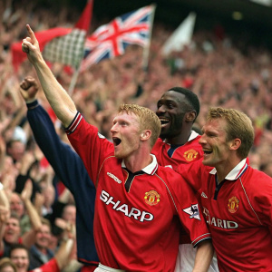 Andy Cole, Paul Scholes, and Teddy Sheringham, celebrating a goal in a packed stadium. Cheerful crowd in background