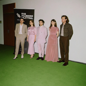 James Welsh, Kate Dickie, Jamie Adams, Shauna Macdonald, and Martin Bell at the Edinburgh Film Festival. All dressed formally. Dark backdrop with festival logo.