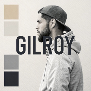 Modern digital graphic featuring the word 'Gilroy' in bold sans-serif font. Centered on the design. Neutral color palette with shades of grey. Clean and minimalist style