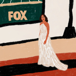 Aubrey Plaza at the 63rd Primetime Emmy Awards, dressed in a flowing off-white gown with a ruffled bodice. The gown features a long train. She stands on the red carpet with the FOX network logo prominently displayed.
