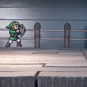 Pixel art depicting Link from The Legend of Zelda in combat pose. Dark green background, green outfit, brown boots, and retro 8-bit style