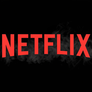 Netflix logo, minimalist design featuring bold red letters on black background, resembling an ink wash effect.