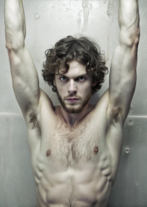 Evan Peters, curly hair, beard, arms up, shower shirtless, showing hairy armpits, by Nick Knight