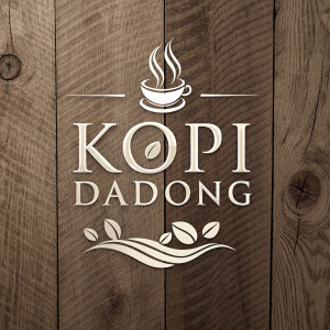 Handcrafted logo for Kopi Dadong. Modern font design on a wooden background.