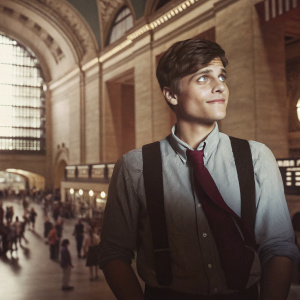 Andy Mientus, actor, in casual outfit. Light blue shirt and black vest. At the Grand Central Station in New York City.