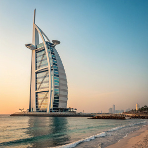 The iconic sail-shaped Burj Al Arab, a luxury hotel located in Dubai, United Arab Emirates. Surrounded by the Persian Gulf, the building stands tall with its distinctive spire