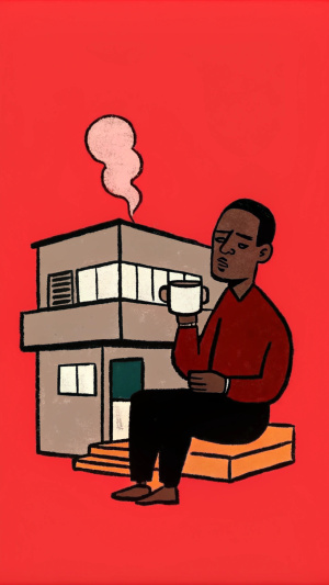 Black Man drinking coffee while sitting outside two storey house with bauhaus design