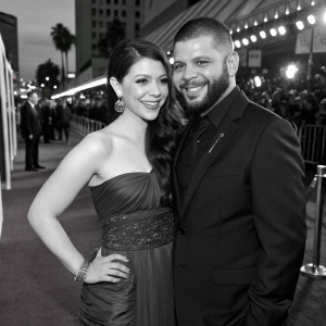 Michelle Trachtenberg and Guillermo Diaz at the Cop Out premiere. Black and white photograph. Red carpet