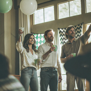 Danica Patrick, Ricky Stenhouse Jr., and Dale Earnhardt Jr. at the NASCAR Championship party. All in casual attire.