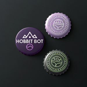 Multiple versions of the Hobbit Bot logo, featuring circular shapes and varying shades of purple, displayed on a sleek black background with the brand name clearly visible.