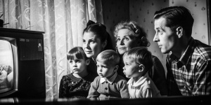 ultra resolution, Children watch diafilms, a Soviet family in the 60s, glitch art, 
soft diffuse light, haze, dof, old lomo lens, vignette, bw, selfie, style by Anne Brigman