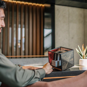 Thomas Medici's anamorphic cube sculpture, a centerpiece for corporate events and marketing. Inspired by Emergence Lab, ideal for branded office supplies and premium gifts.
