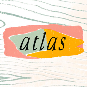 Vintage styled logo of Atlas brand in serif font against a rustic wood background.