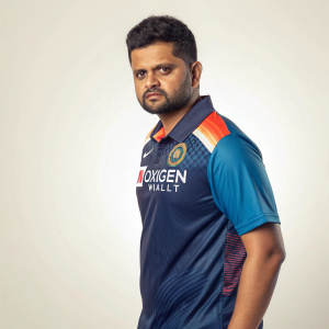 Close-up portrait of Suresh Raina, wearing jersey with Oxigen Wallet logo. Simple, clean background. Cricket star with intense gaze.