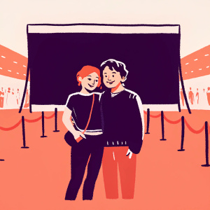Sophia Lillis and Wyatt Oleff at a comic-con event, posing in front of a large banner. Sophia is wearing a black t-shirt, Wyatt is in a dark sweater