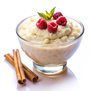 Gluten-free rice pudding on white background