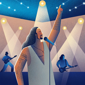 Brandon Boyd, lead singer of Incubus, performing live. Muscular build, long wavy hair, arm tattoos. Dynamic pose with microphone. Warm stage lights, guitarist in background.