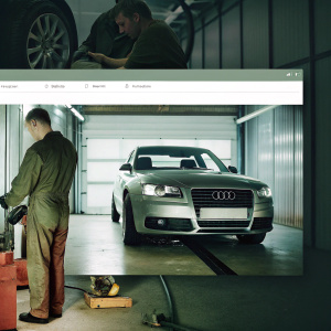 JH Motorsport's website showcases a clean, modern webpage featuring a detailed image of an Audi vehicle being meticulously serviced by skilled mechanics in a brightly lit garage. The site's design incorporates a sleek header and intuitive navigation bars, highlighting premium parts for the B7 R54 engine, all rendered in a sophisticated palette of grays, blacks, and metallic hues.