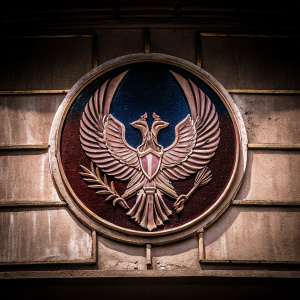 The logo for Garuda Tactical M4, featuring a majestic mythical creature with detailed blue feathers and gold accents. Dark backdrop, striking visual impact