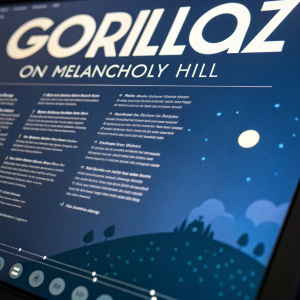 A detailed screenshot of a lyric sheet for Gorillaz's 'On Melancholy Hill'. Dark blue background with white font. Focuses on emotions and a relationship. Title and verses clearly visible.