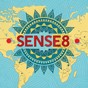 A vibrant poster for the Netflix series Sense8. The logo, in bold red, is surrounded by a colorful, intricate map of the world. The map's design is inspired by ancient atlases with a modern twist, featuring bright hues of blue and yellow.