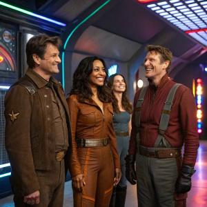 Firefly cast reunion, colorful sci-fi set. Nathan Fillion, Gina Torres, Morena Baccarin, Alan Tudyk in space Western outfits