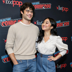 Noah Centineo and Lana Condor at the New York Comic Con. Casual outfits, informal pose.