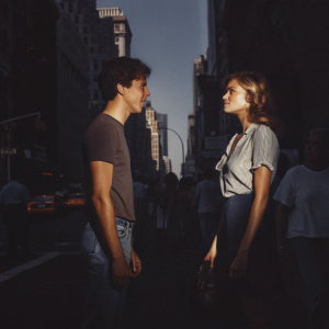 Nat Wolff and Cara Delevingne in a casual meet-up. Crowded urban street in New York City.
