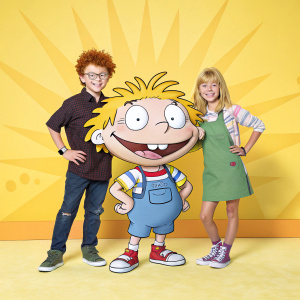 Rugrats cast, including Tommy Pickles, Chuckie Finster, and Angelica Pickles, posing happily against a sunny yellow backdrop.