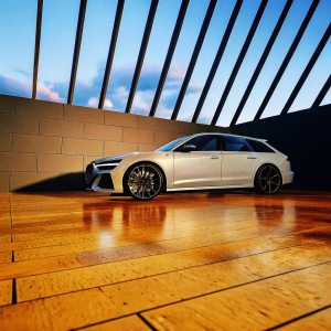 In a sleek modern showroom, a pristine gray Audi RS6 Avant stands out. The car, with its aggressive aerodynamic design and clean body, is centered against a backdrop of angular red lights and a dark gray wall, enhancing the dramatic and moody ambiance.